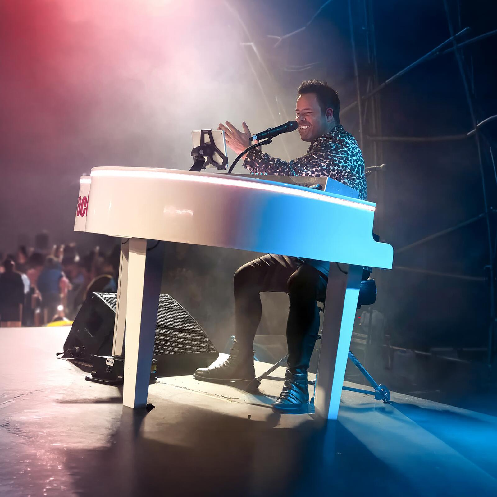 Carl Williams performing live at the piano