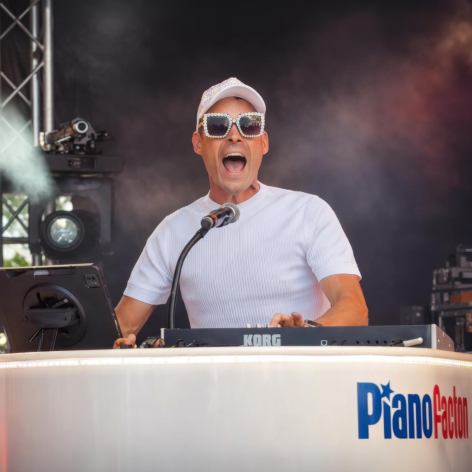 Carl Williams entertaining guests at an event