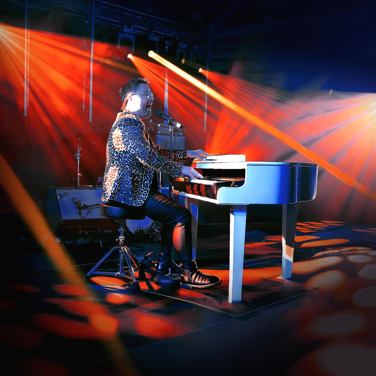 Carl Williams performing on the baby grand piano